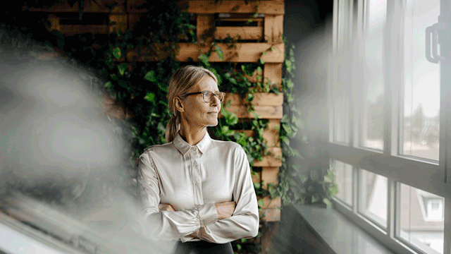 Woman looking out of window